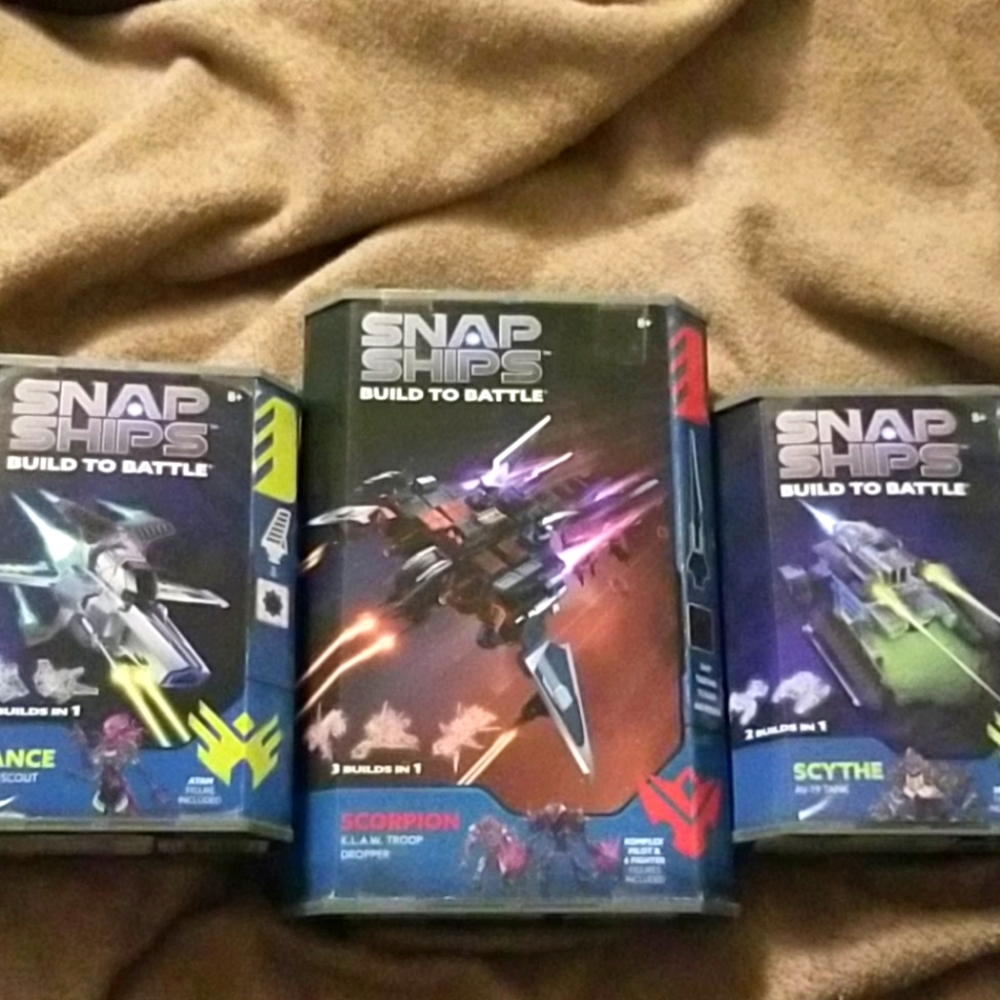 NEW in box.  3 Never opened Snap Ships